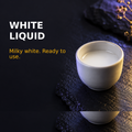 Small white ceramic glass containing a modest amount of milky white Liquid ORMUS.