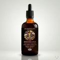 Bottle of Nootropic Gold Mushroom Blend with dropper on a gray background
