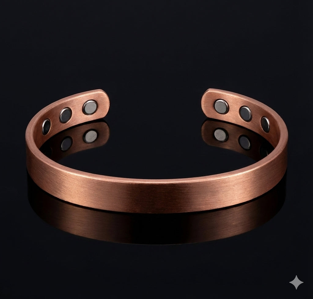 Copper bracelet with magnets on a black background