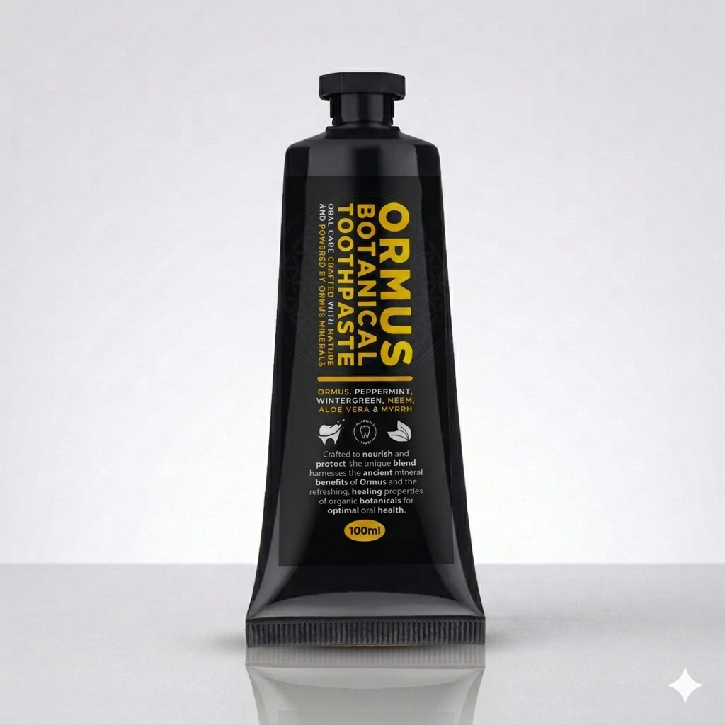 Black tube of ORMUS Botanical Toothpaste on a white background