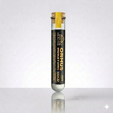 Ormus Monatomic Gold product in a test tube on a white background