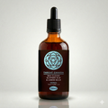 Bottle of Throat Chakra herbal tincture with a dropper on a light gray background