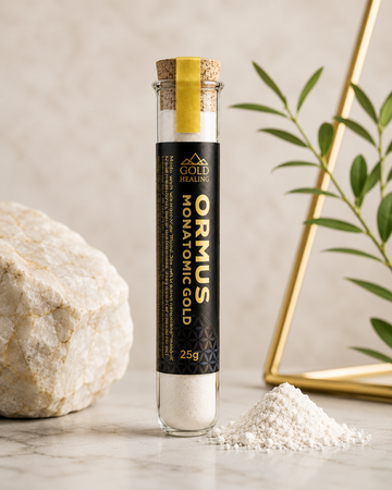 Gold Healing Ormus Monatomic Gold Powder in glass vial with white mineral powder and natural stone display